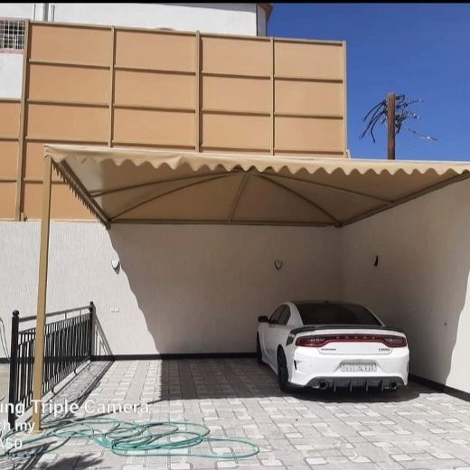 إنشاء وتركيب مظلات مواقف السيارات في الباحة